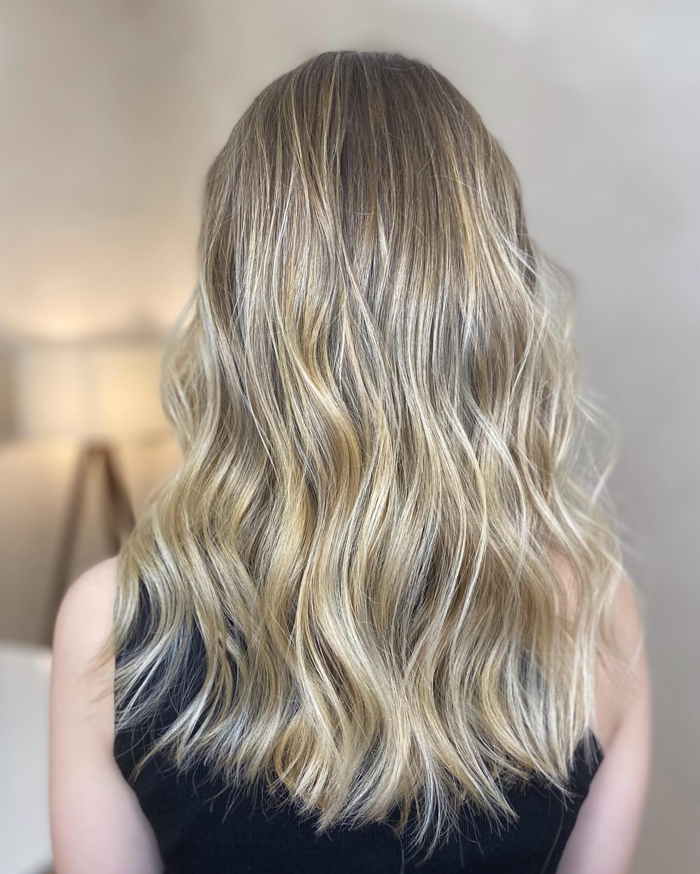 Client in chair during finishing spray